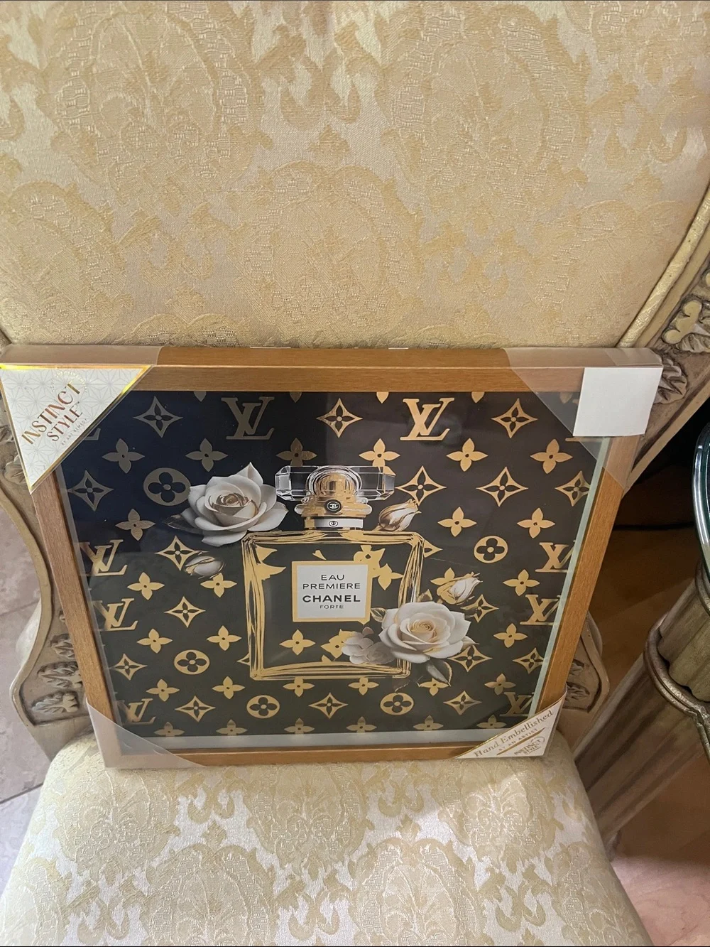 CHANEL Black and Gold Eau Première Framed Wall Art with White Floral Accents
